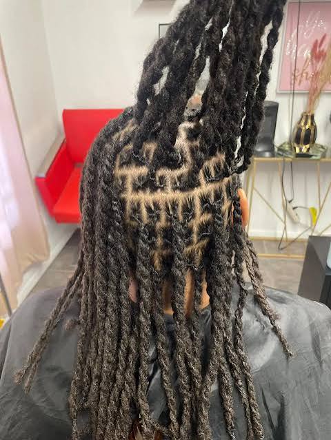Freshly retwisted locs styled by BK_de Stylist